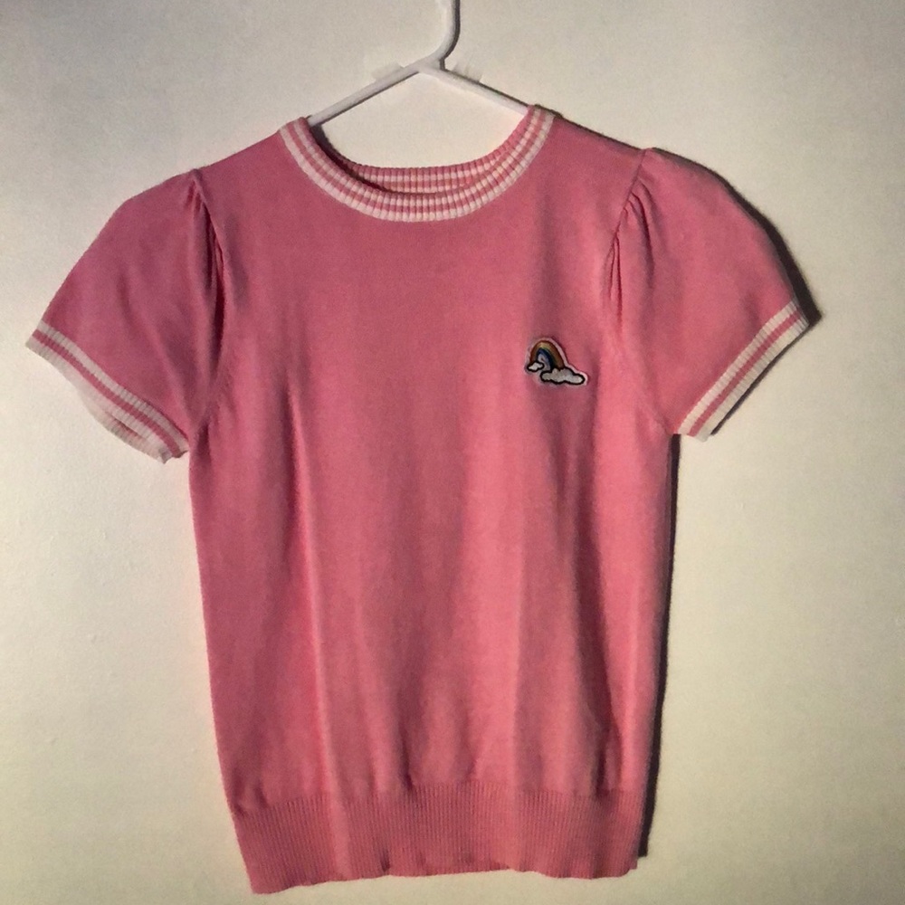 pink top with rainbow patch